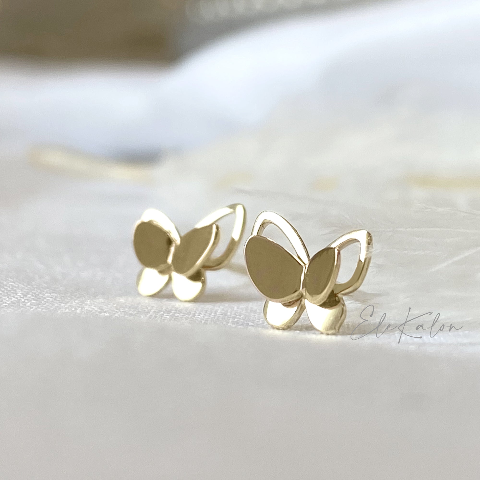 Buy Gold Plated Plain Butterfly Cut Work Earrings by MNSH Online at Aza  Fashions.